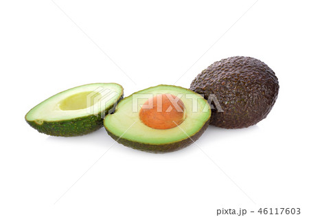 whole and half cut fresh avocado on white 46117603