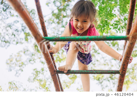 Happy kid playing in the playground 46120404