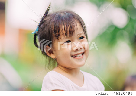 smiling and laughing Asian baby 46120499