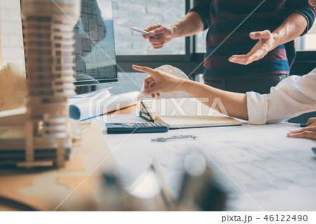 Team of Construction engineering or architect hands working on b Team of Construction engineering or architect hands working on b 46122490