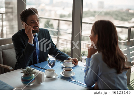 Two colleagues having business lunch in restaurant 46123149