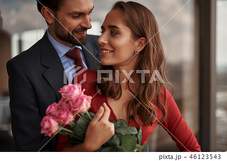 Joyful man and woman having romantic meeting Joyful man and woman having romantic meeting 46123543