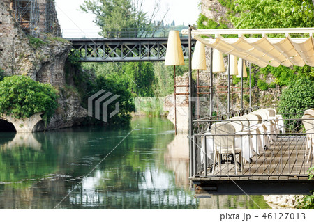 Beautiful terrace of a restaurant above the river 46127013