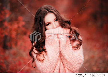 Young sexy woman in Living Coral color of the year 2019. Young sexy woman in Living Coral color of the year 2019. 46130684