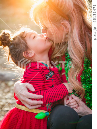 Grandmother and Mixed Race Baby Girl Kiss Outdoors Grandmother and Mixed Race Baby Girl Kiss Outdoors 46131471