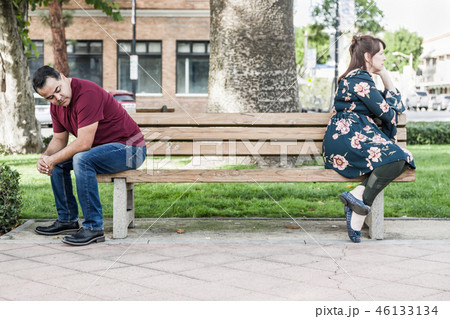 Arguing Couple Sitting Face Away From Each Other 46133134