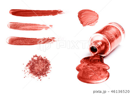Swatches of cosmetic products in trendy coral color. 46136520