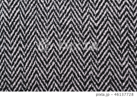 Gray Herringbone Tweed coat background. Gray Herringbone Tweed coat background. 46137728