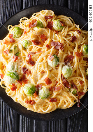 Italian pasta cooked with Brussels sprouts, ham 46140563