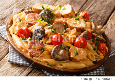 penne with grilled chicken, wild mushrooms penne with grilled chicken, wild mushrooms 46140681