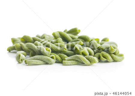 Uncooked spinach gemelli pasta. Uncooked spinach gemelli pasta. 46144054
