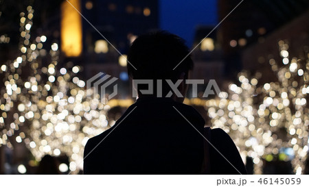 Silhouette of Asian guy back, alone in Christmas Silhouette of Asian guy back, alone in Christmas 46145059