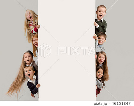 Banner with a surprised children peeking at the edge Banner with a surprised children peeking at the edge 46151847