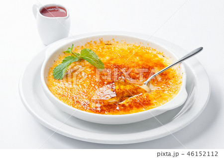 French dessert creme brulee with berry sauce  46152112