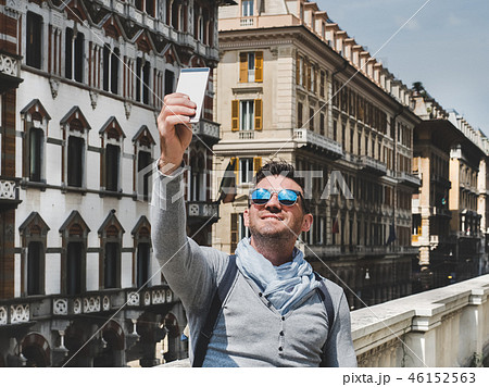 Stylish, happy man with a smartphone Stylish, happy man with a smartphone 46152563