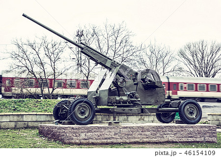 Anti-aircraft machine gun and train in motion 46154109