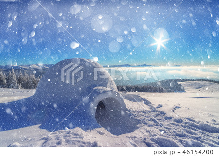 Real snow igloo house in the winter Carpathian mountains 46154200