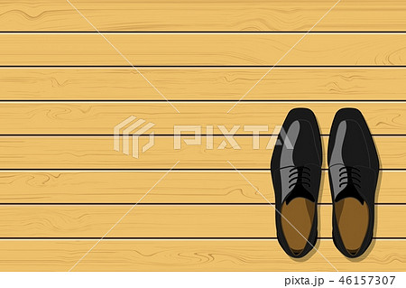 Top view of black leather men's shoes on wooden Top view of black leather men's shoes on wooden 46157307