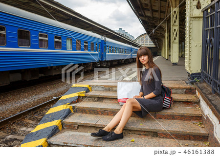 beautiful woman on the platform of railway  46161388