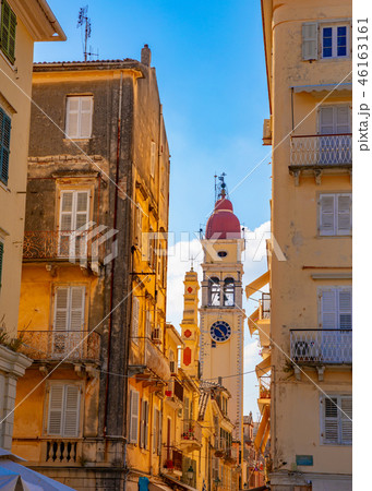 Street and the bell tower of the church of Saint Spyridon in Corfu, Greece 46163161