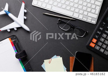 Business trip concept. Accessories on desk table Business trip concept. Accessories on desk table 46165162