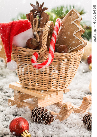 still life with Christmas tree decor and gifts 46166469