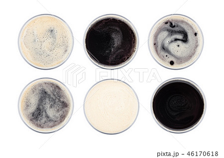 Glass of dark stout beer top view with foam 46170618