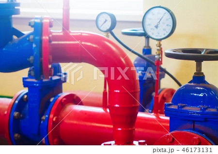 Industrial pipes and pressure sensors at factory Industrial pipes and pressure sensors at factory 46173131