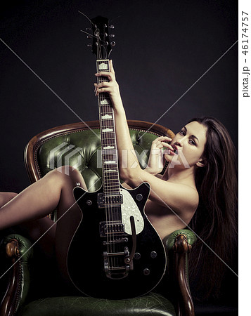 Naked Female Guitarist
