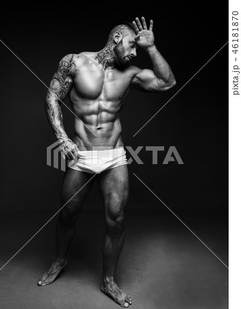 Black and white contast portrait of sexy man with muscular body. Sexi male model. Hot macho 46181870