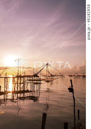 sunrise with fishing trap in pak pra village sunrise with fishing trap in pak pra village 46182858