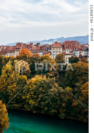 Autumn foliage, Aare river and Bern old building 46189655