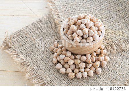 beautiful chickpeas on wood cup 46190778