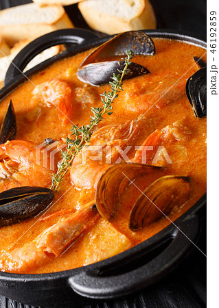 Spanish Suquet de Peix soup with seafood 46192859