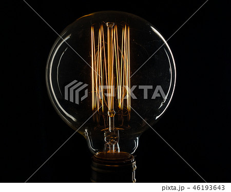 Edison's light bulb illuminates from electric current 46193643