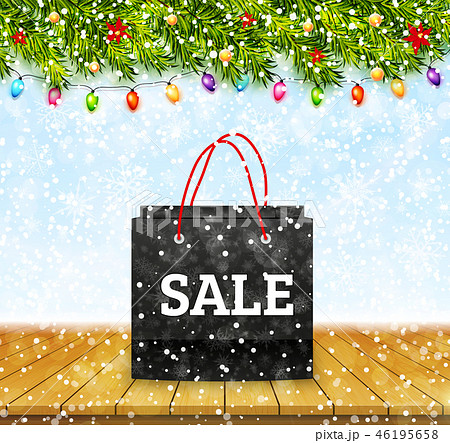 Christmas sale. Shoping paper bag on wood table 46195658