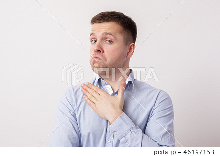proud young man haughtily looks forward 46197153
