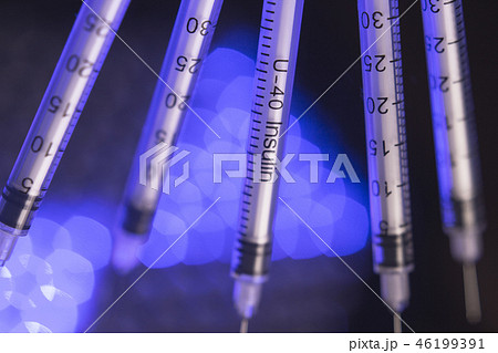 Syringes on colorful background unfocused 46199391