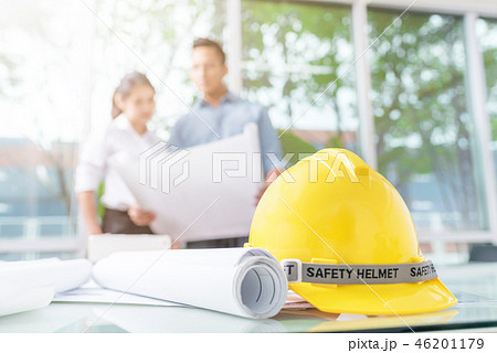 Architect discussing about construction project Architect discussing about construction project 46201179