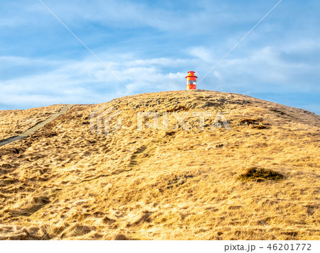 Stykkisholmur lighthouse on hill in Iceland 46201772