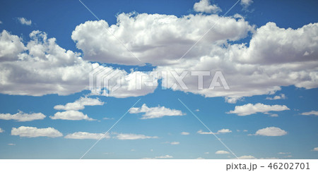 Bright blue sky with puffy clouds over Moab Utah Bright blue sky with puffy clouds over Moab Utah 46202701