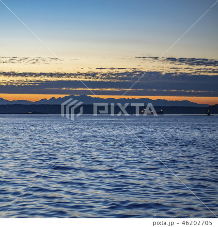 Boats in Tacoma bay with a dramatic sky at sunset Boats in Tacoma bay with a dramatic sky at sunset 46202705