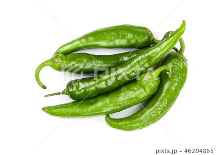 green hot chili peppers isolated on white background. Top view. Flat lay pattern green hot chili peppers isolated on white background. Top view. Flat lay pattern 46204865