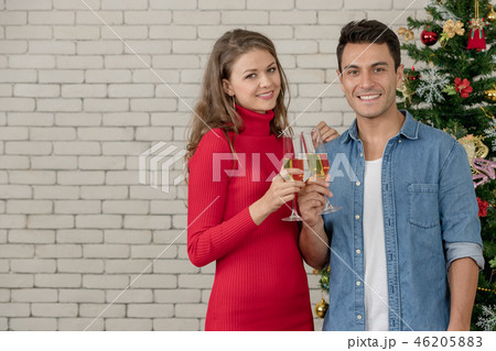Couple are celebrating Xmas and new year. 46205883