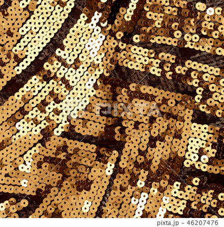 Fabric with bright golden sequins Fabric with bright golden sequins 46207476