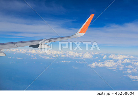 Sky with airplane wing Sky with airplane wing 46208004
