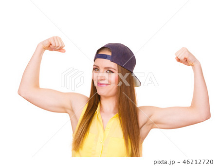Girl showing her muscles 46212720