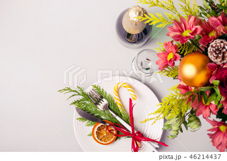 Holiday Christmas table setting. Winter bouquet and natural decoration of tableware Holiday Christmas table setting. Winter bouquet and natural decoration of tableware 46214437
