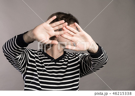 I give up. Attractive unshaven stylish man shows palms, demonstrates his innocence, surrenders I give up. Attractive unshaven stylish man shows palms, demonstrates his innocence, surrenders 46215338