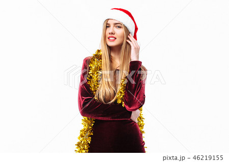 Happy woman in santa hat and dress 46219155